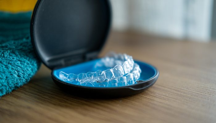 Transparent teeth aligners in a box.